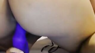 Busty Ebony dildoing her wet pussy