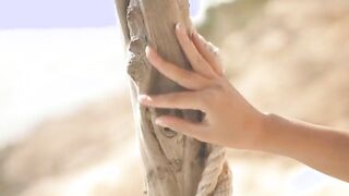 Uninhibited natural Beauty masturbates outdoors on her vacation