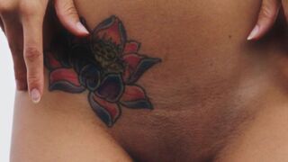 Hot Latina shows tattoo and hot pussy