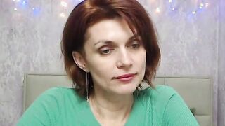 Ginger MILF in red dress on webcam live show
