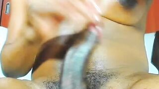 Amateur trans wanks big black cock on webcam