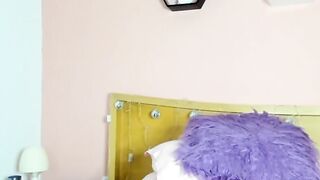 Small tits Colombian masturbates in bed on webcam