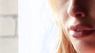 Sexy blonde muse teasing in the shower