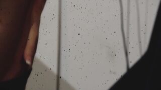 Sexy blonde muse teasing in the shower