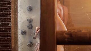 Sexy blonde muse teasing in the shower
