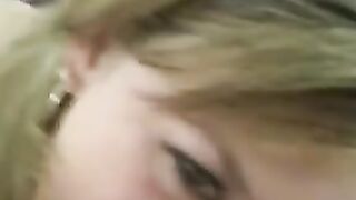 Racy bimbo licking nuts