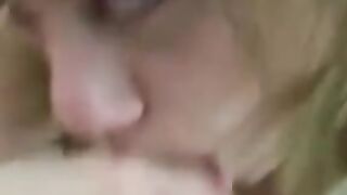 Racy bimbo licking nuts