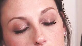 busty milf gets nude on couch and toys pussy with vibrator