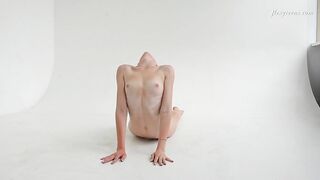Dressed flexible dark haired Alla Sinichka