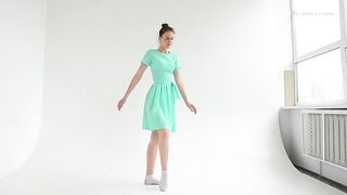 Dressed flexible dark haired Alla Sinichka