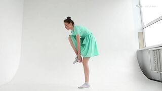 Dressed flexible dark haired Alla Sinichka