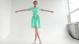 Dressed flexible dark haired Alla Sinichka