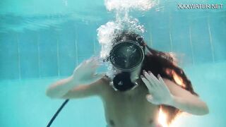 Hungarian beauty Nora Shmandora gets orgasms in the pool