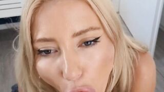 Cock hungry blonde kneels and fucks her face with dildo