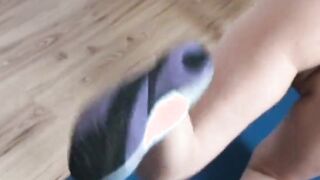 Dark Hair pleasuring her wet vagina on a mat