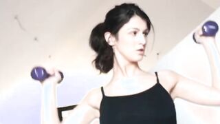Dark Hair pleasuring her wet vagina on a mat