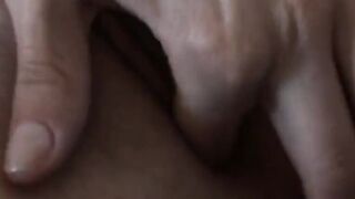Dark Hair pleasuring her wet vagina on a mat