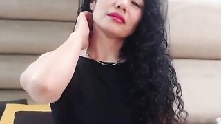 Amateur mature Latina solo in bed on webcam