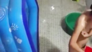 Asian stepdaughter spied in the bathhouse