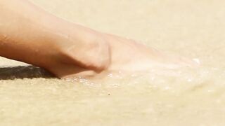 Skinny blondie stripping at the beach