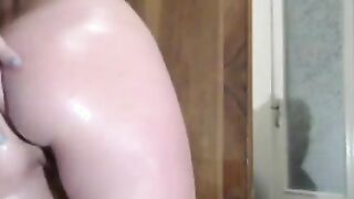 Naughty Babe oiled up and stripping for you