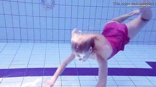 Russian babe goddess Elena Proklova swims naked