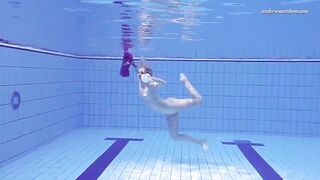 Russian babe goddess Elena Proklova swims naked