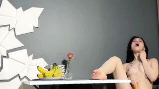 Teen girl using banana to cum
