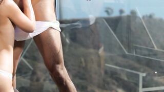 Latina MILF having sex on a balcony