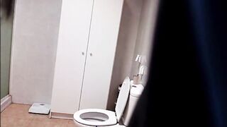 Hot secretary having a quick pee