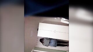 Hot secretary having a quick pee