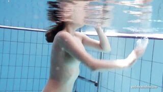 Zuzanna swims naked and horny inside the pool