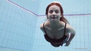 Zuzanna swims naked and horny inside the pool