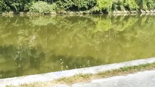 Outdoor blowjob on the canal