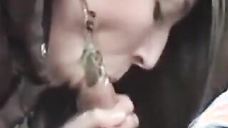 Cute girl gives a blowjob in a car