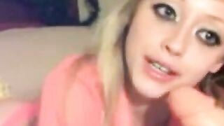 Webcam girl sucks a dildo