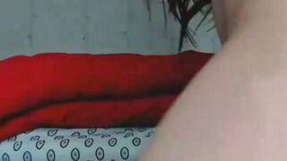 brunette plays with her sex toys on camera