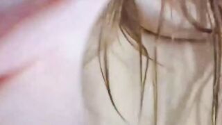 brunette plays with her sex toys on camera