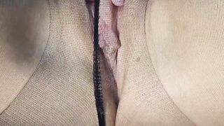 An orgasm rubbed her wet pussy in black nylon pantyhose 2