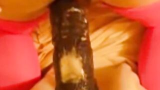 bitch in miniskirt and pink stockings riding her big dildo