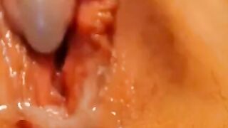 Brunette girl on webcam fingers her pussy.