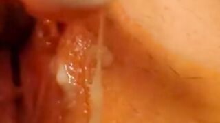 Brunette girl on webcam fingers her pussy.