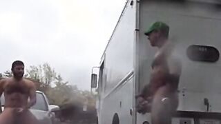 Public Rainy Stroking in a Parking Lot by Two Horny Men