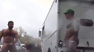Public Rainy Stroking in a Parking Lot by Two Horny Men