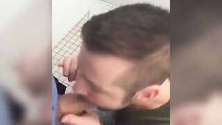 Hunk gives blowjob in a public restroom - amateur gay porn