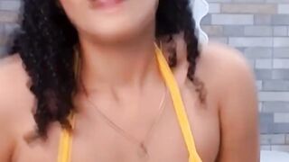 Exotic Babe With Curly Hair And A Big Ass Strips Her Bikini On Camera