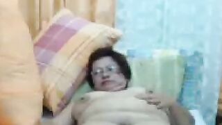 Filipina Granny with Glasses Shows Her Tits on Webcam
