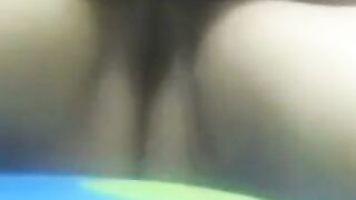 Lesbian amateurs in missionary tribadism filmed from behind.
