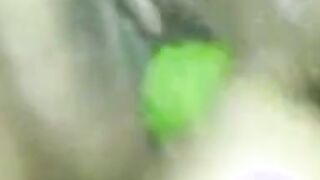 Arab Asian Girl in Hijab Tries Vegetable