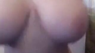 Big-Titted Cam Girl Flashes Her Assets